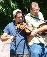 Jonathan Dillard and his father, David, raising money to honor veterans.
